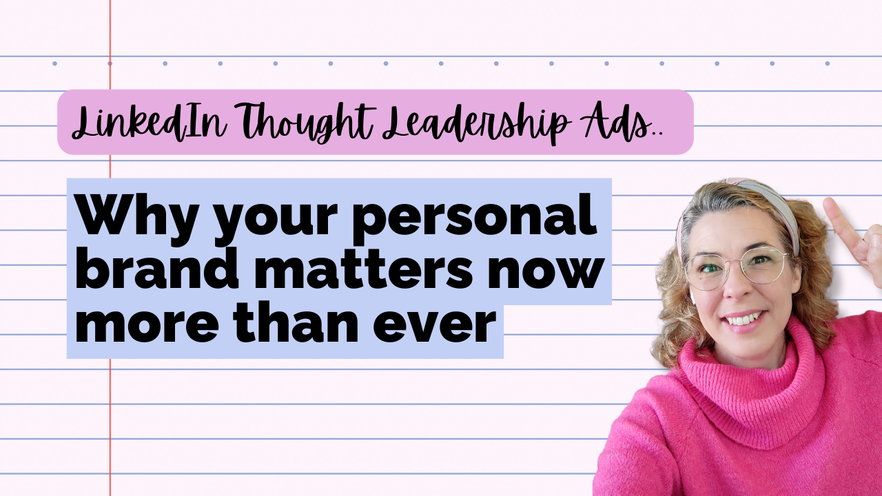 The image features a pink background resembling lined notebook paper. At the top, there is a pink label with the text "LinkedIn Thought Leadership Ads" in black cursive font. Below, the main message "Why your personal brand matters now more than ever" is written in bold black font on a light blue background. To the right, a woman with light brown hair, glasses, and a pink sweater is smiling and pointing to the sign with her index finger